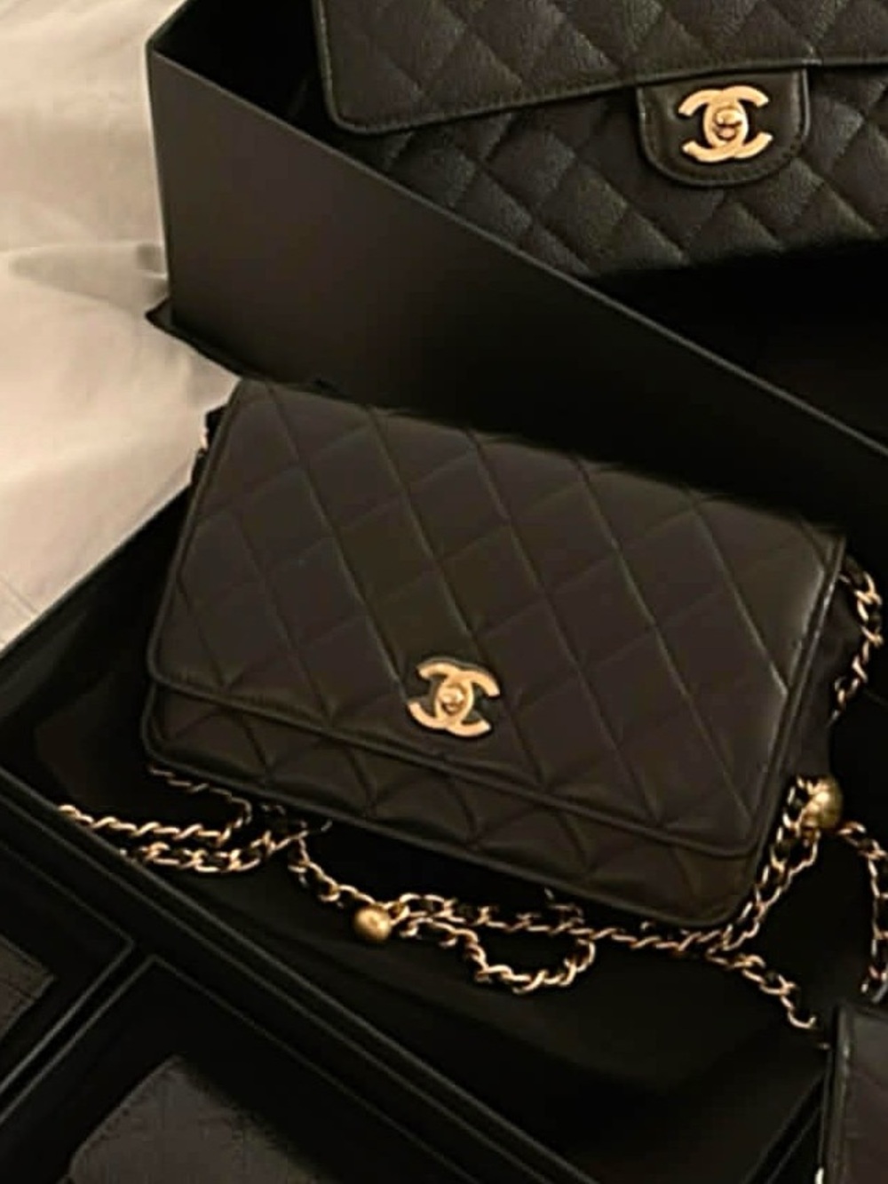 CHANEL Black Quilted Leather Crossbody with Gold Chain and CC Turn-Lock